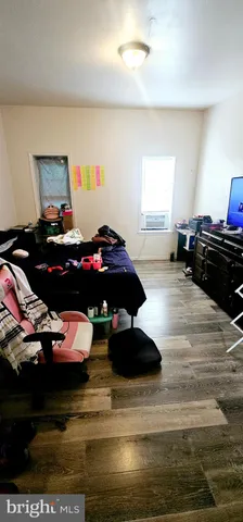 a room with furniture and a window