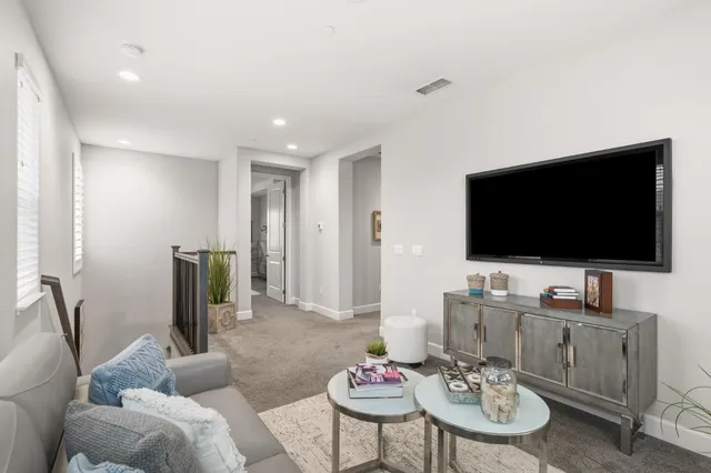 a bedroom with bed and a window