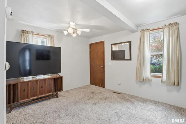 wooden floor and windows in an empty room