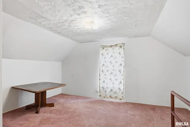 a view of an empty room with window