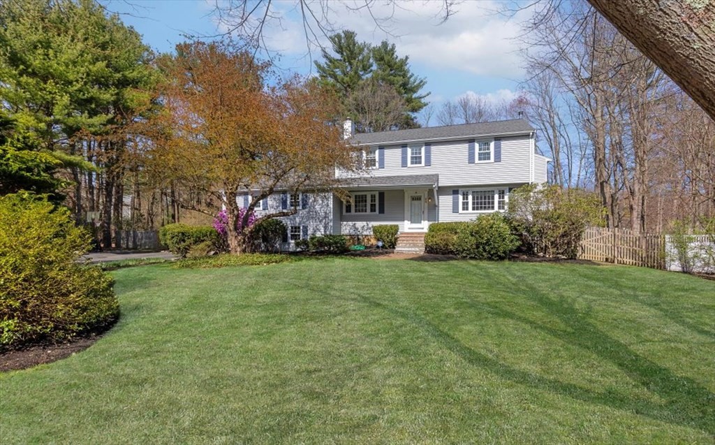 26 Stanford Drive Hingham, MA 02043 - Photo 1 of 37 a view of a house with a big yard and large trees