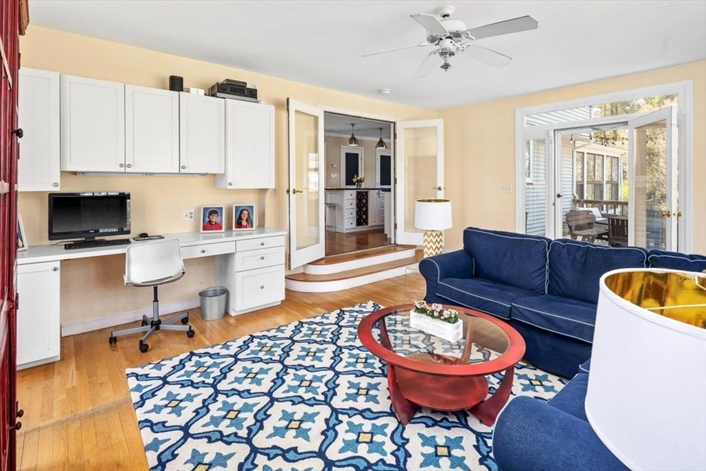 26 Stanford Drive Hingham, MA 02043 - Photo 12 of 37 a living room with furniture a rug and a window