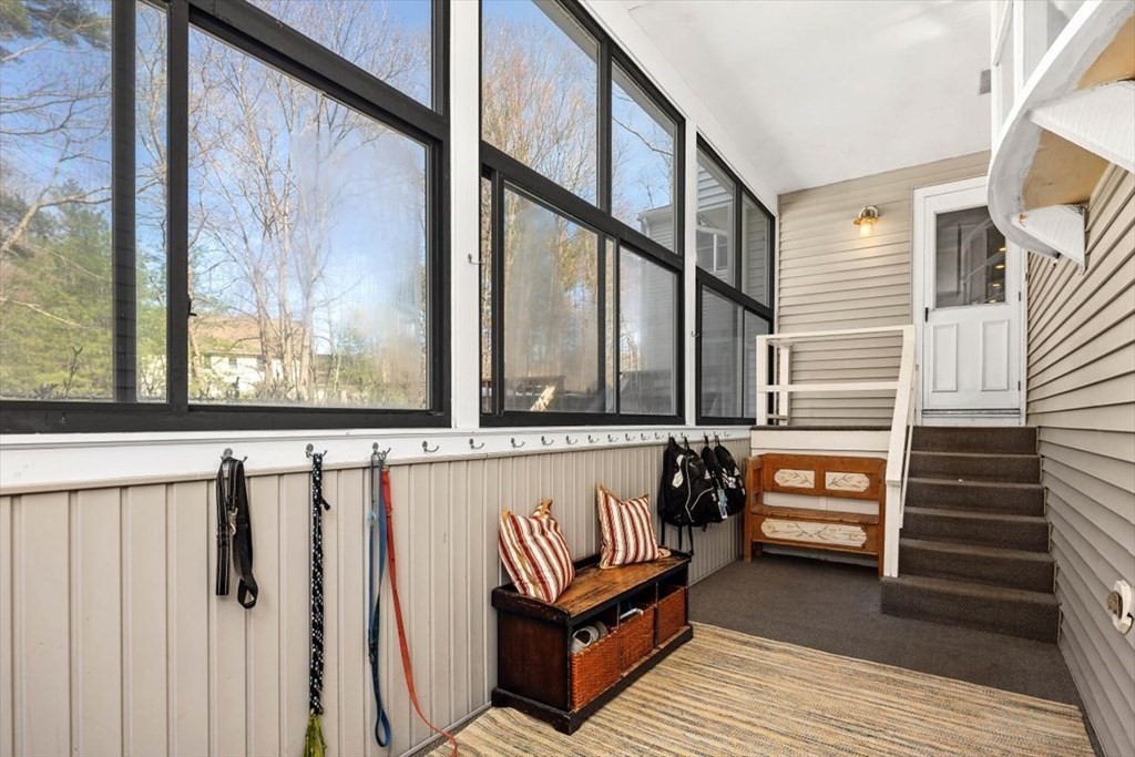 26 Stanford Drive Hingham, MA 02043 - Photo 2 of 37 a view of a two chairs in the balcony
