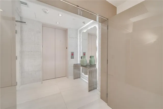 a bathroom with a shower and a toilet