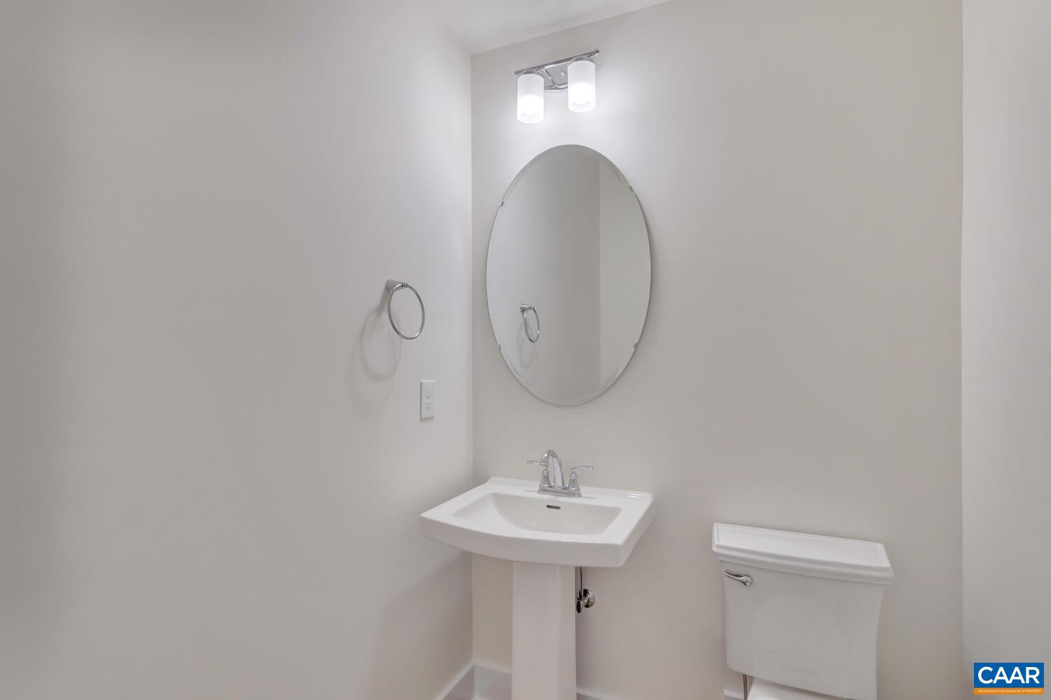3031 Eagle View Charlottesville, VA 22903 - Photo 11 of 75 a bathroom with a sink and a mirror