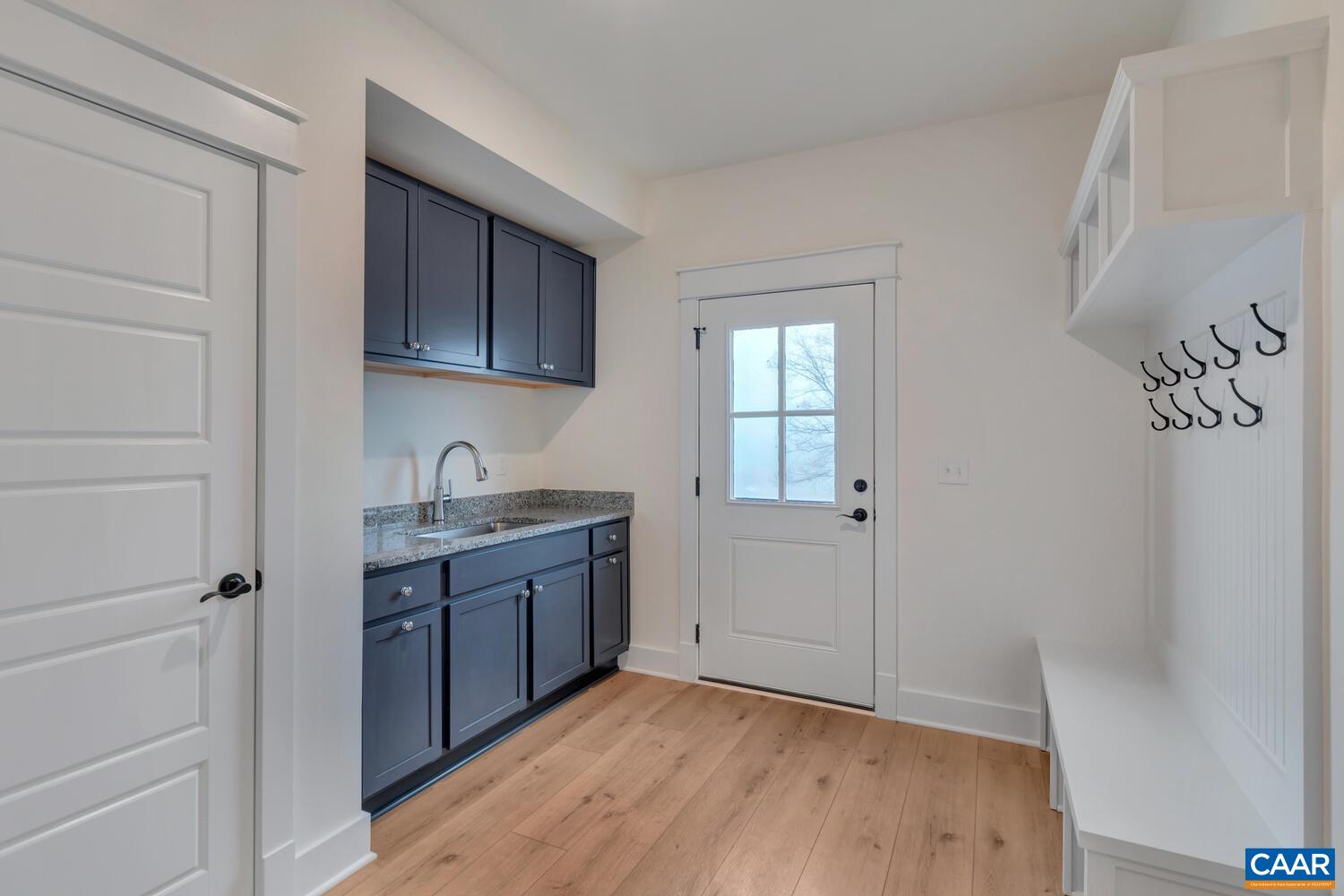 3031 Eagle View Charlottesville, VA 22903 - Photo 12 of 75 a kitchen with granite countertop a sink and cabinets