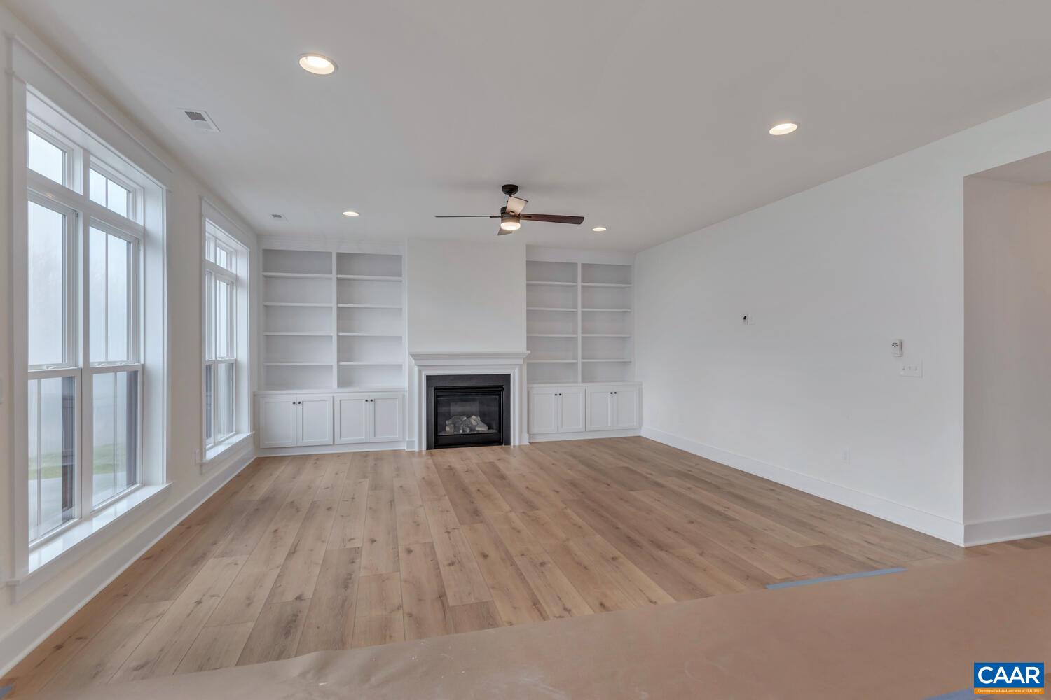 3031 Eagle View Charlottesville, VA 22903 - Photo 17 of 75 a view of an empty room with a fireplace and a window
