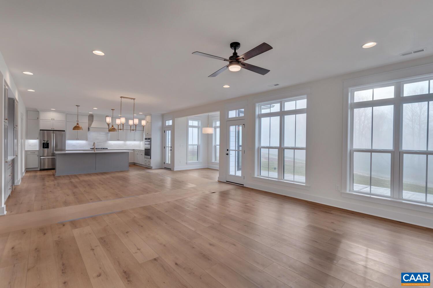 3031 Eagle View Charlottesville, VA 22903 - Photo 18 of 75 a view of an empty room with wooden floor and a window