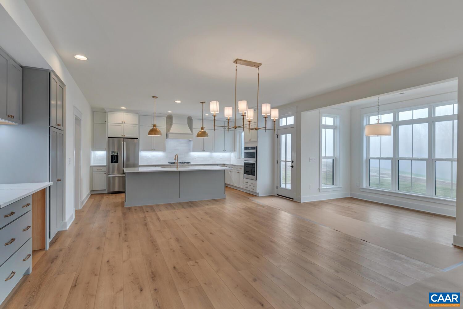 3031 Eagle View Charlottesville, VA 22903 - Photo 20 of 75 a large kitchen with granite countertop a large counter top stainless steel appliances and cabinets