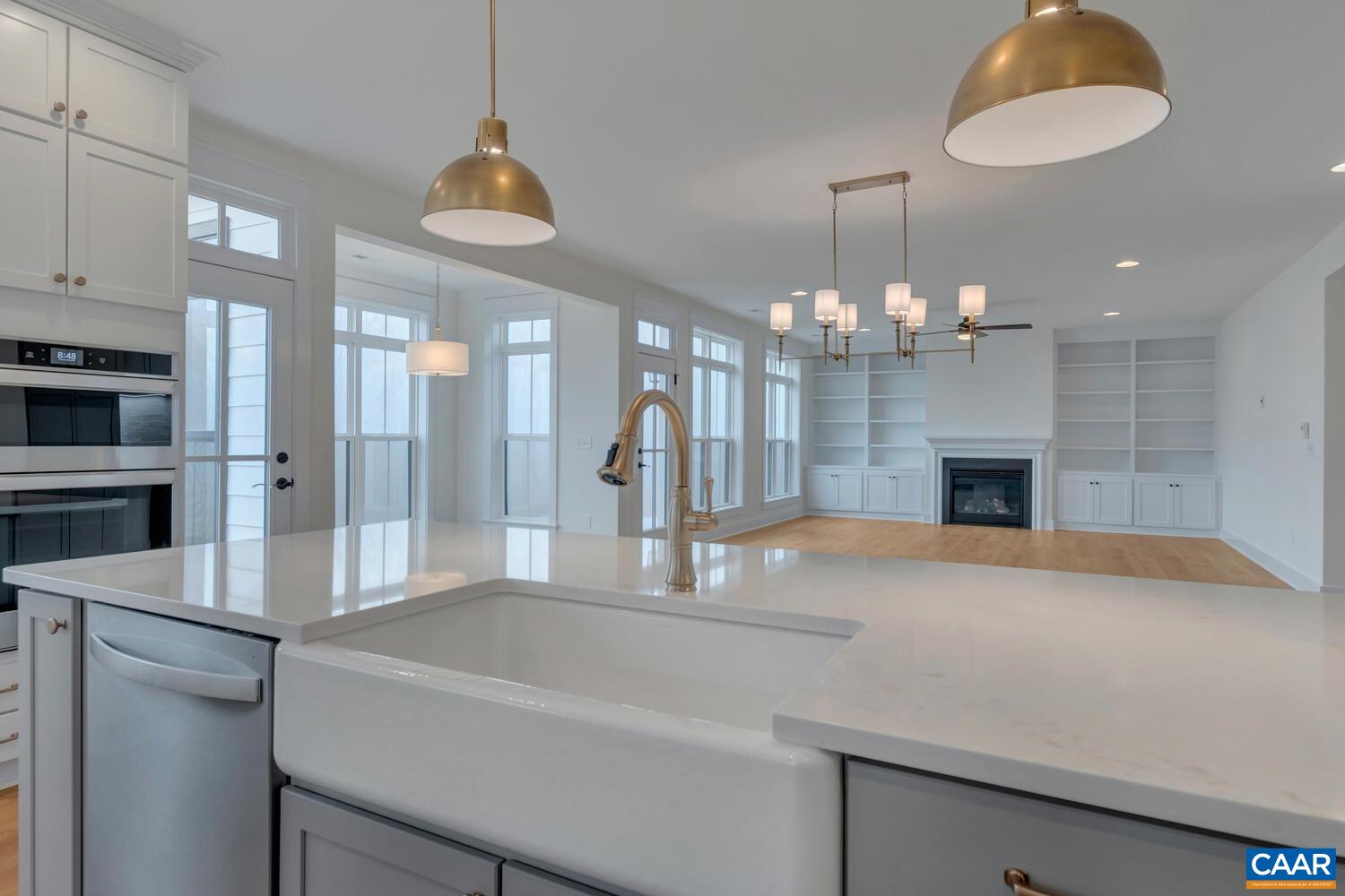 3031 Eagle View Charlottesville, VA 22903 - Photo 32 of 75 a large kitchen with a chandelier stainless steel appliances and a chandelier