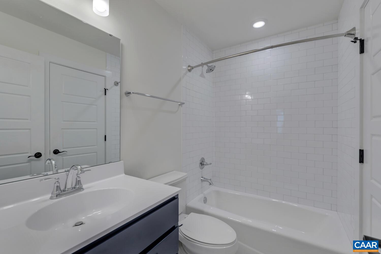 3031 Eagle View Charlottesville, VA 22903 - Photo 34 of 75 a bathroom with a sink toilet and shower