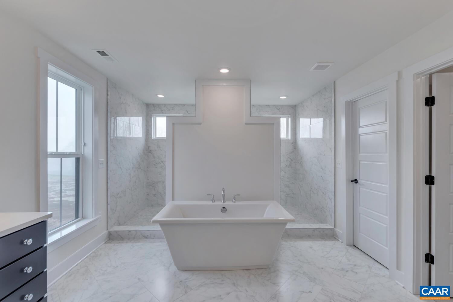 3031 Eagle View Charlottesville, VA 22903 - Photo 49 of 75 a bathroom with a bathtub and shower