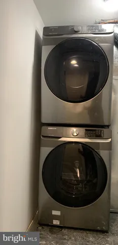 a kitchen with a sink stove and refrigerator