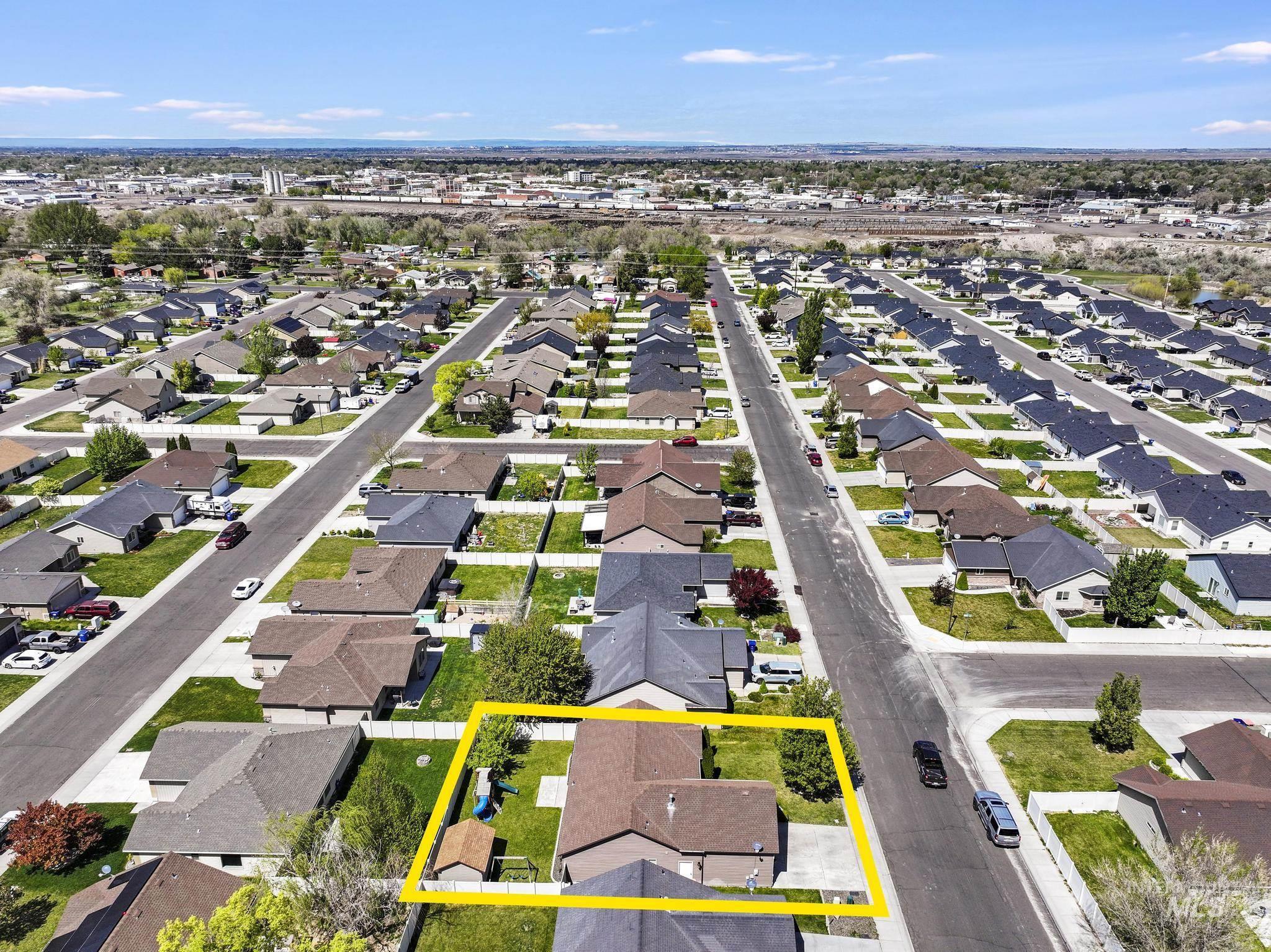 446 Noble Street Twin Falls, ID 83301 - Photo 42 of 42 Aerial perspective showcasing a residential neighborhood with single-family homes on paved streets
