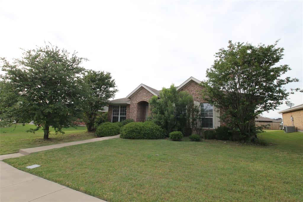4188 Cherry Ridge Drive Frisco, TX 75033 - Photo 3 of 25 a view of a house with a yard