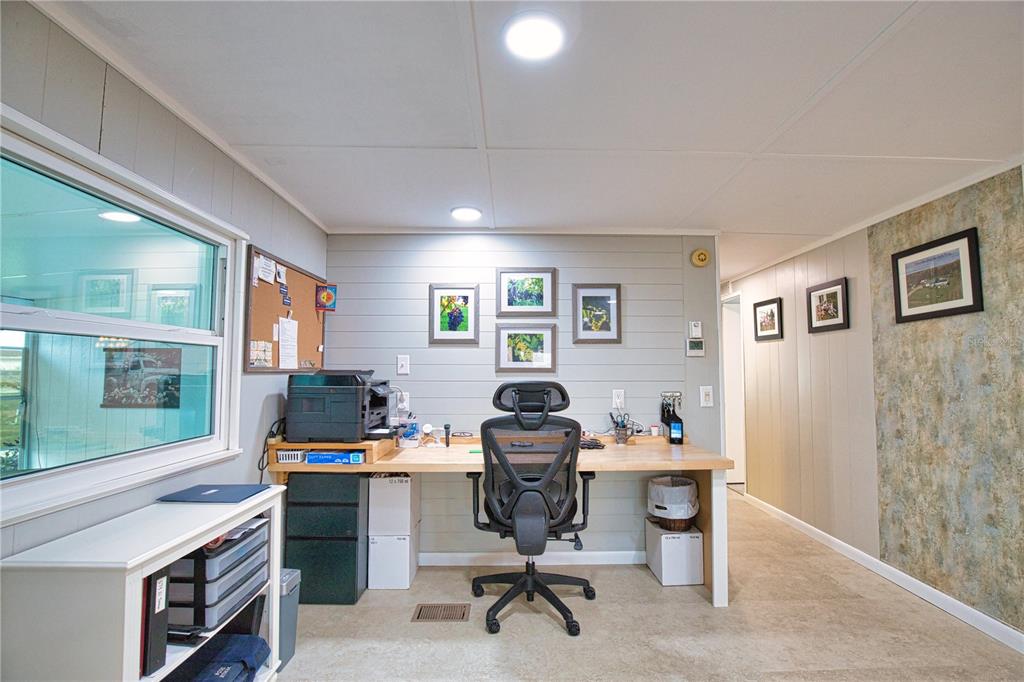 674 El Tango North Port, FL 34287 - Photo 14 of 85 a view of a workspace with furniture and a window