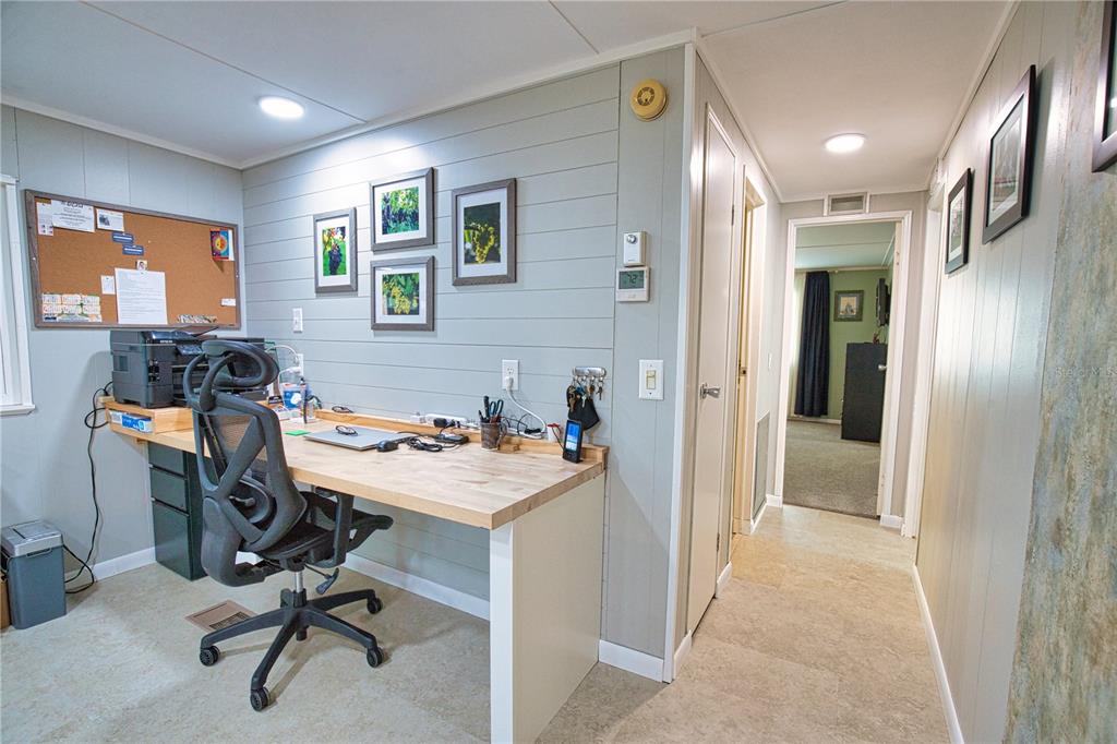 674 El Tango North Port, FL 34287 - Photo 18 of 85 a view of a workspace with furniture and a window