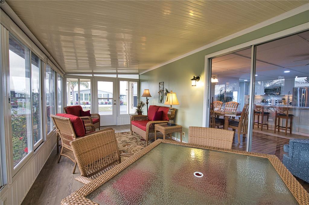 674 El Tango North Port, FL 34287 - Photo 27 of 85 a living room with furniture and a large window