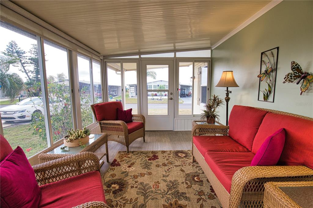 674 El Tango North Port, FL 34287 - Photo 28 of 85 a living room with furniture and a large window