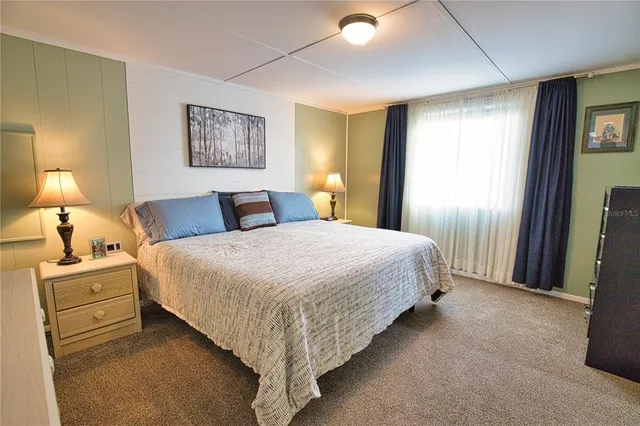 a utility room with sink dryer and washer