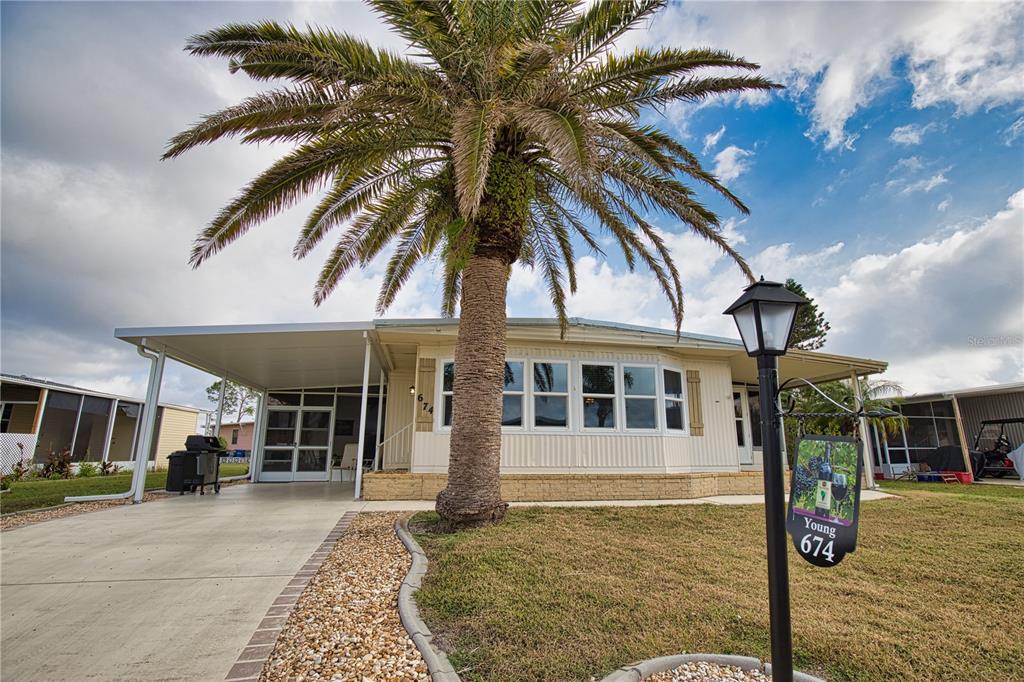 674 El Tango North Port, FL 34287 - Photo 44 of 85 a view of a house with a patio