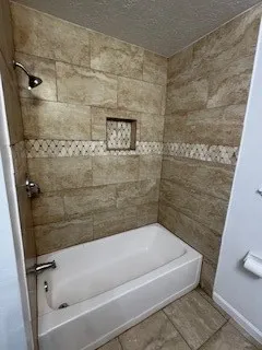 a bathroom with a bathtub
