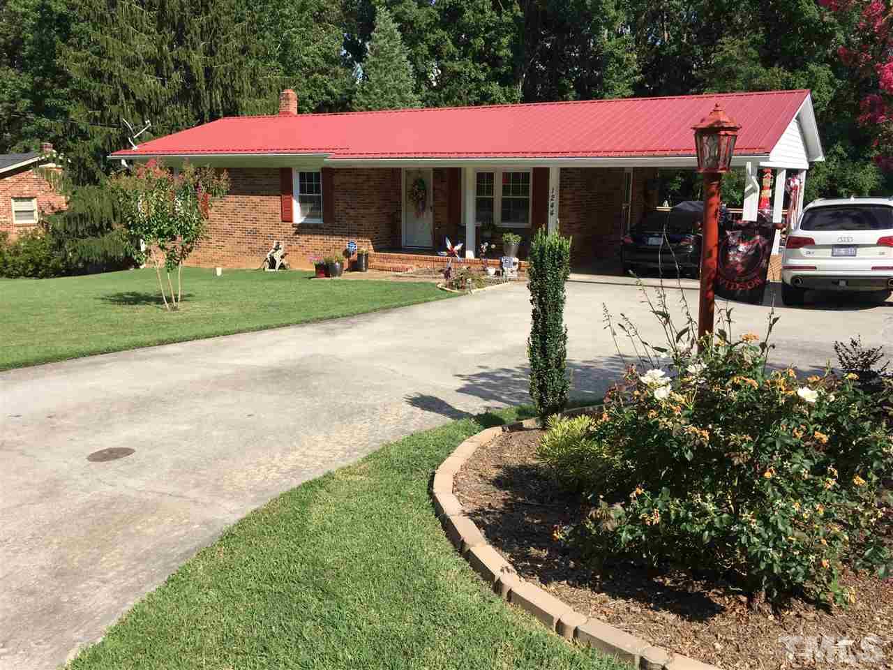 1244 Ridge Road Roxboro, NC 27573 - Photo 1 of 22 a view of outdoor space yard and patio