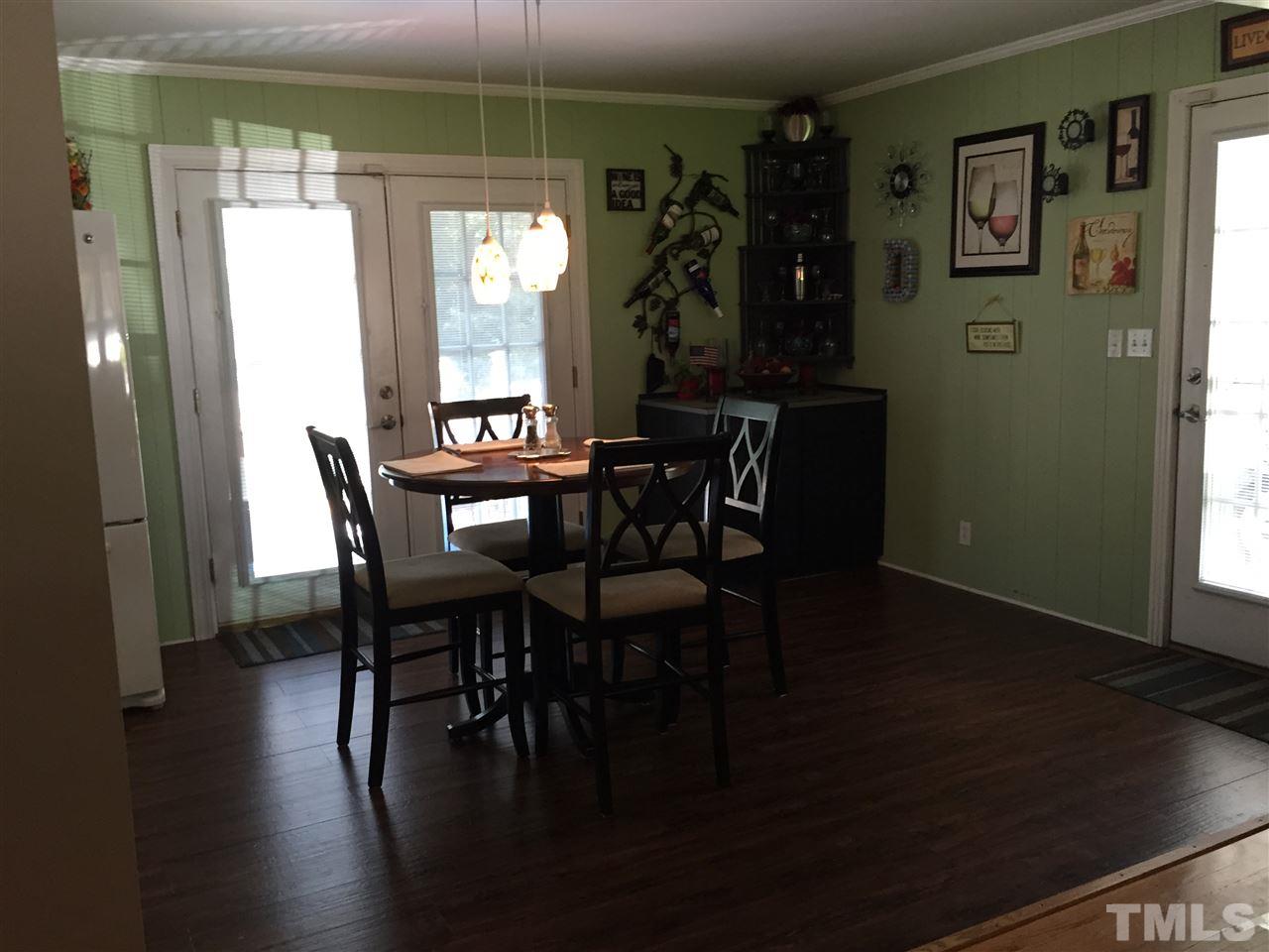 1244 Ridge Road Roxboro, NC 27573 - Photo 6 of 22 a dining room with furniture and window