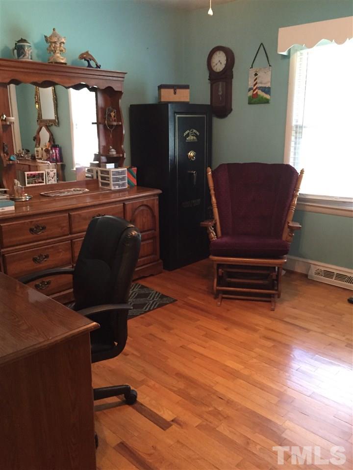 1244 Ridge Road Roxboro, NC 27573 - Photo 8 of 22 a room with furniture and a window