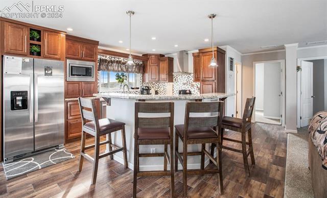 7013 Ranch Road Hartsel, CO 80449 - Photo 7 of 23 Counter bar provide additional seating or serving space.