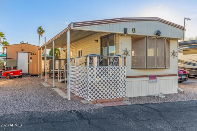 a front view of a house with garage
