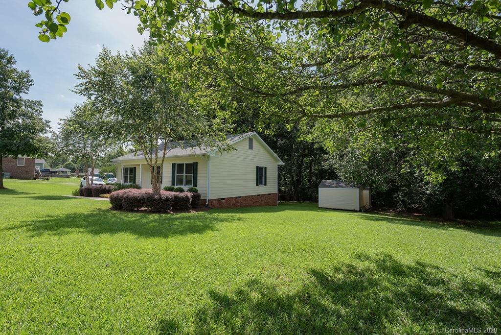 3316 Griffith Road Monroe, NC 28112 - Photo 2 of 28 a view of a house with a yard and sitting area