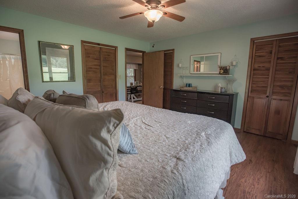 3316 Griffith Road Monroe, NC 28112 - Photo 11 of 28 a bed room with a bed and a dresser