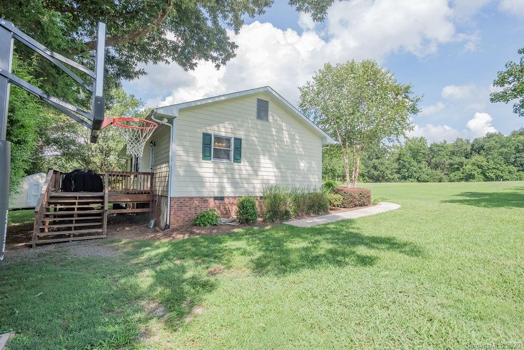 3316 Griffith Road Monroe, NC 28112 - Photo 27 of 28 a view of a house with a yard and sitting area