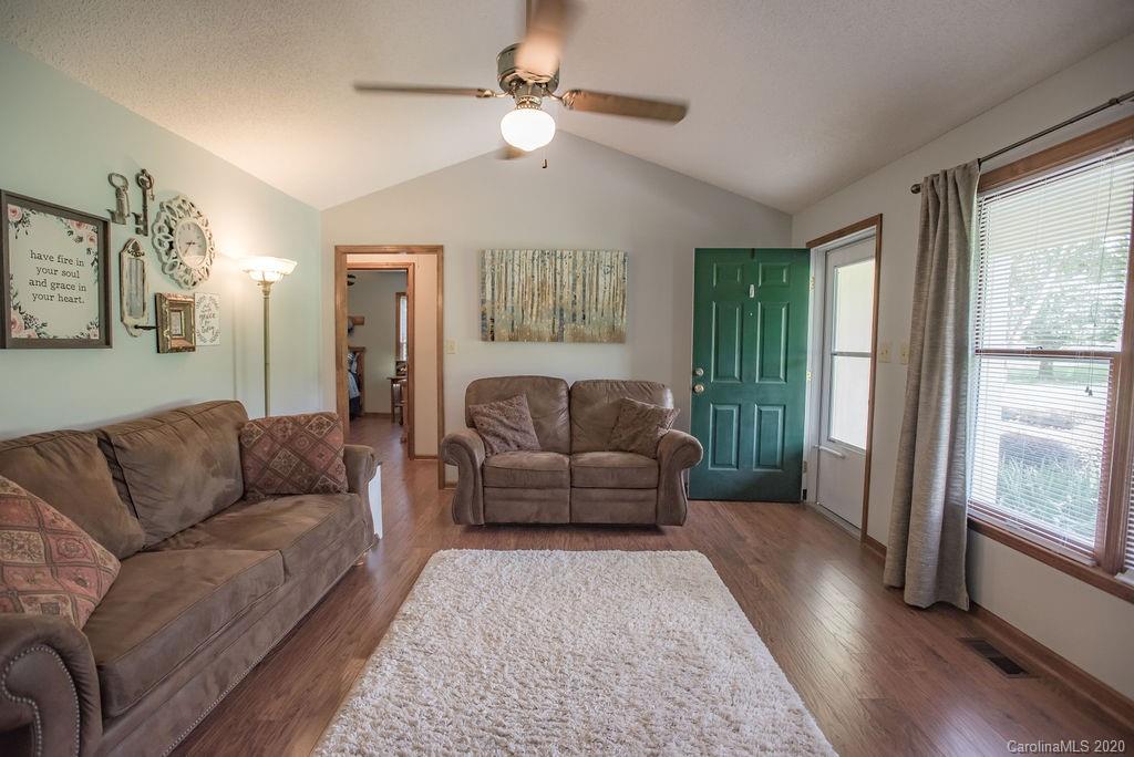 3316 Griffith Road Monroe, NC 28112 - Photo 7 of 28 a living room with furniture and a large window