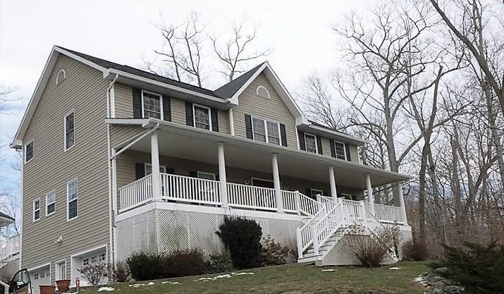 97 Croton Dam Road Ossining, NY 10562 - Photo 1 of 1 a front view of a house with a yard
