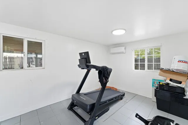 a view of a room with gym equipment