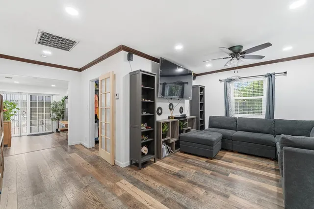 a living room with furniture and a window