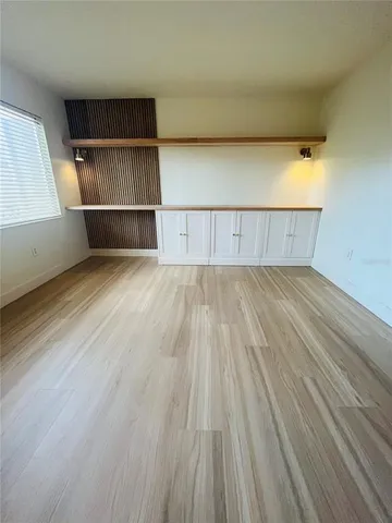 a view of a room with a large window