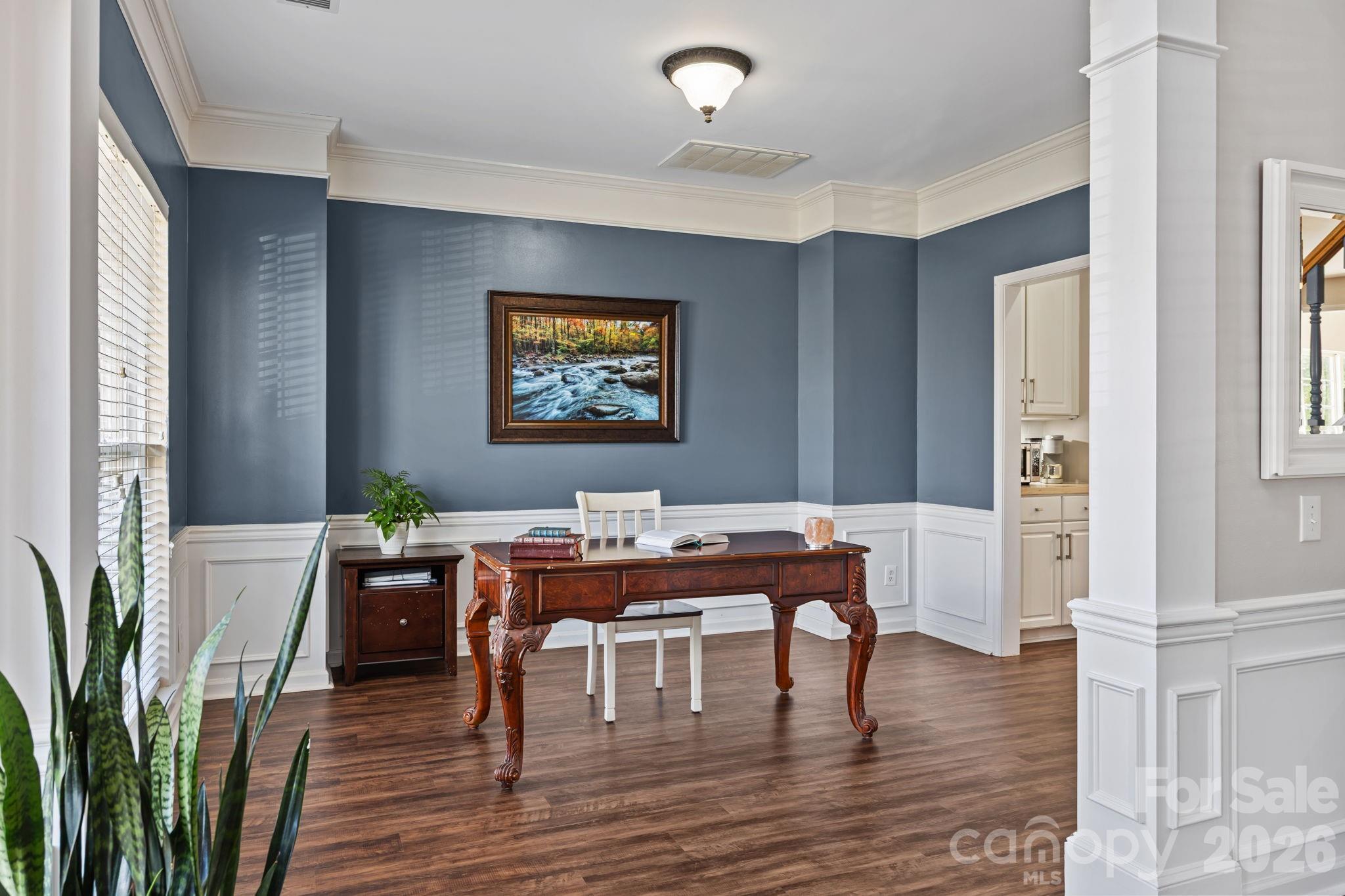 173 Coronilla Road Mooresville, NC 28117 - Photo 4 of 41 a view of a workspace with furniture and wooden floor