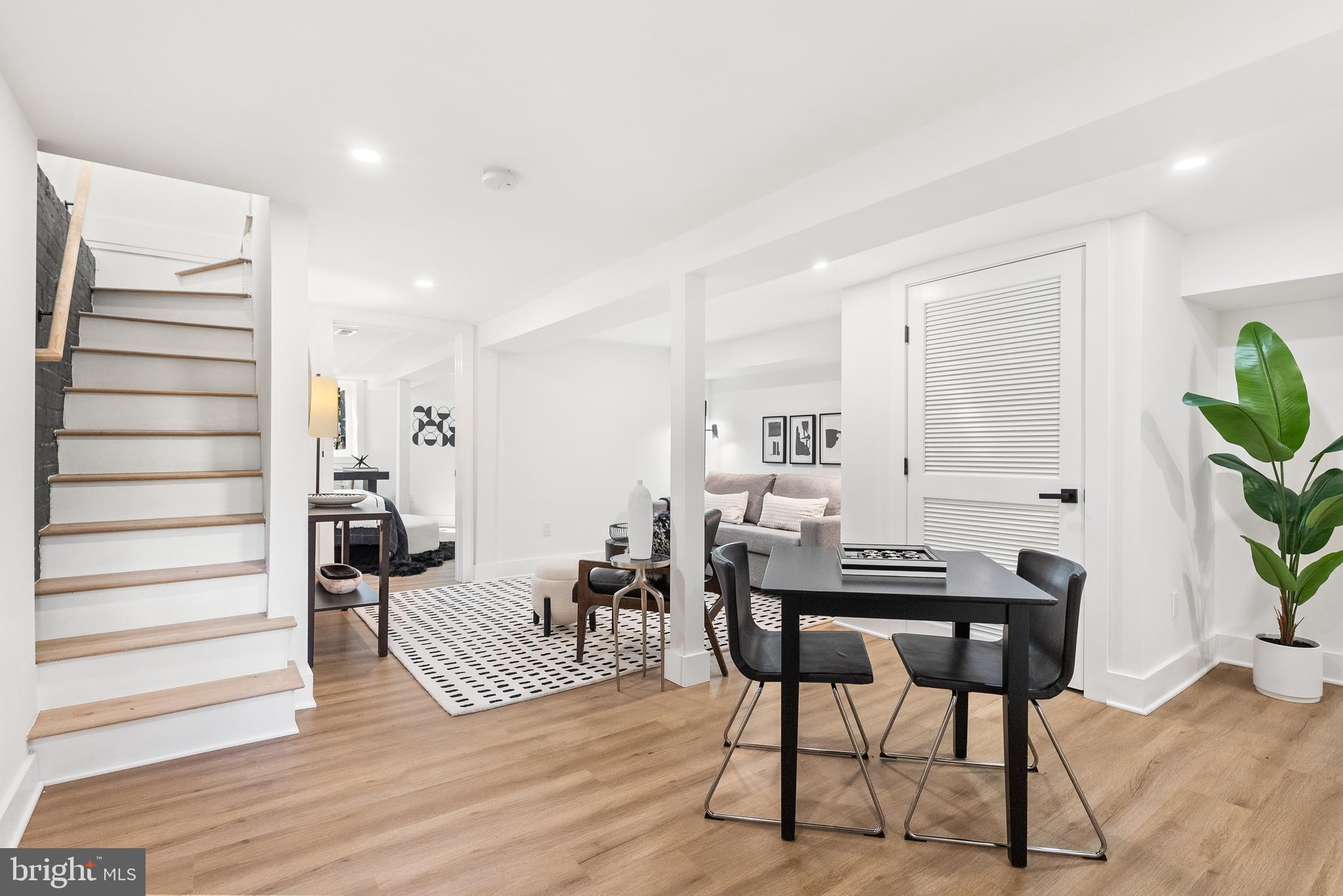 1361 Spring Road Northwest Washington, DC 20010 - Photo 27 of 40 a view of a livingroom with furniture and a kitchen