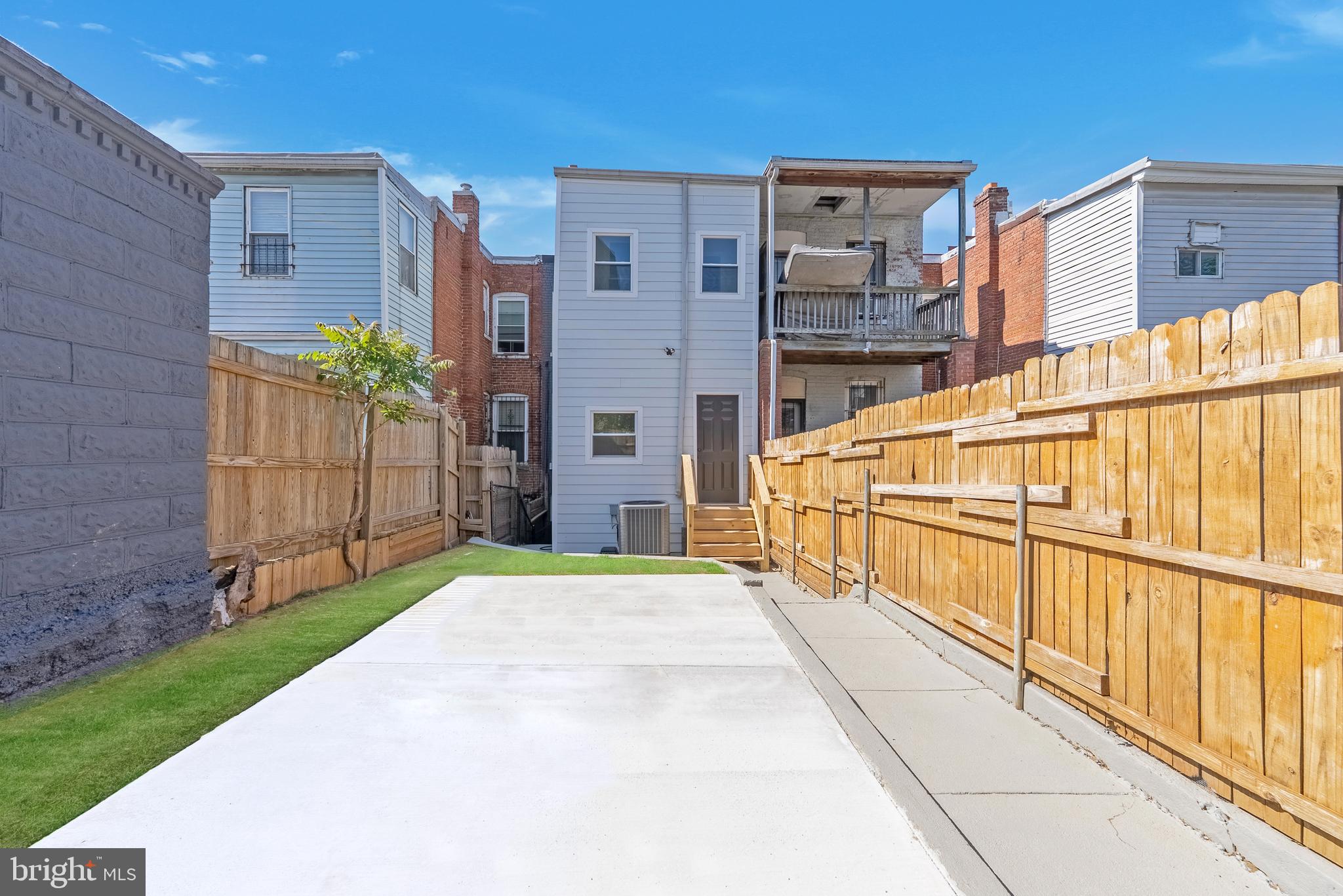 1361 Spring Road Northwest Washington, DC 20010 - Photo 34 of 40 a view of a house with a yard