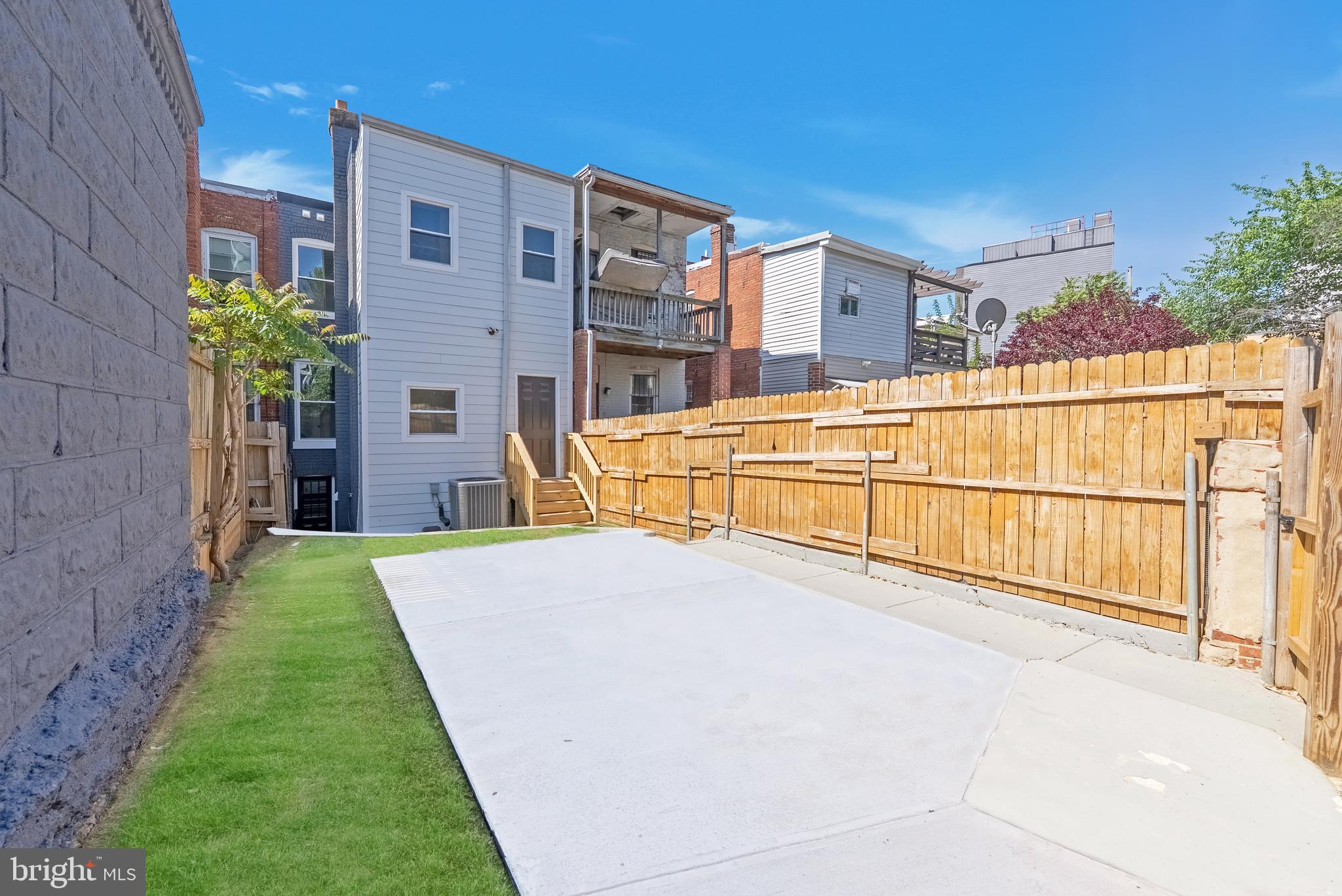 1361 Spring Road Northwest Washington, DC 20010 - Photo 36 of 40 a view of an house with backyard and swimming pool