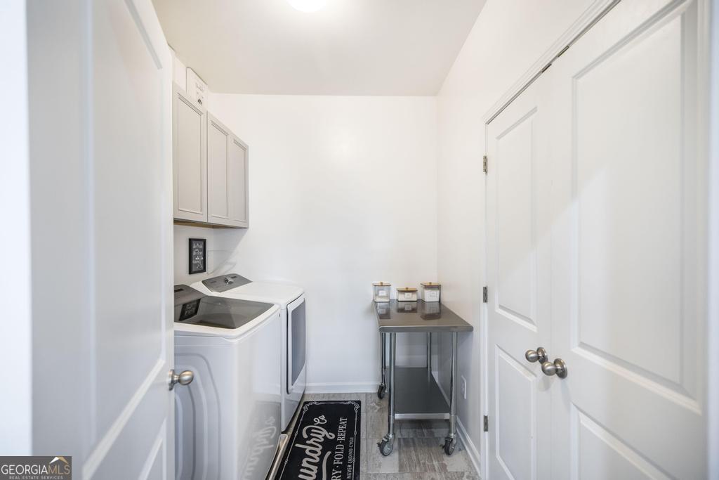 209 Adirondac Way Bonaire, GA 31005 - Photo 17 of 22 a bathroom with a sink a toilet and shower