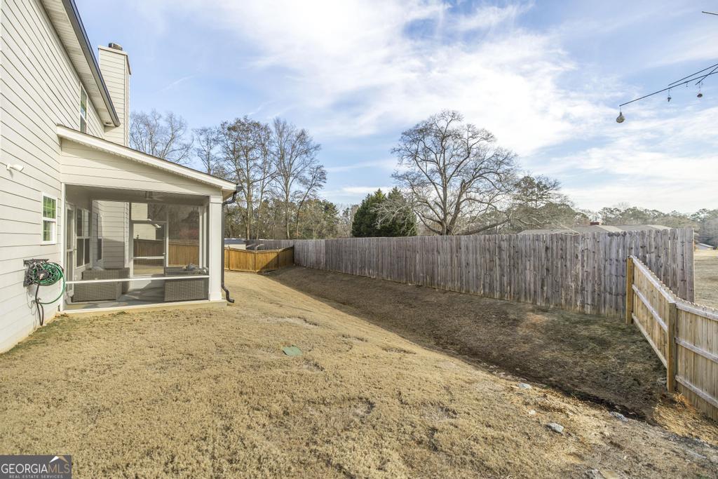 209 Adirondac Way Bonaire, GA 31005 - Photo 20 of 22 a view of backyard with green space