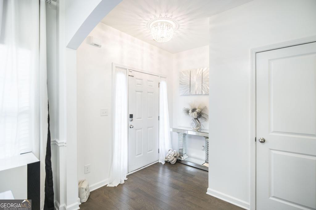 209 Adirondac Way Bonaire, GA 31005 - Photo 2 of 22 a view of empty room with wooden floor