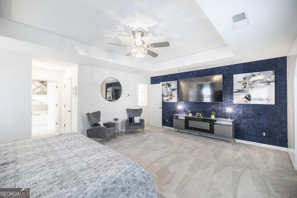 209 Adirondac Way Bonaire, GA 31005 - Photo 10 of 22 a living room with furniture and a flat screen tv