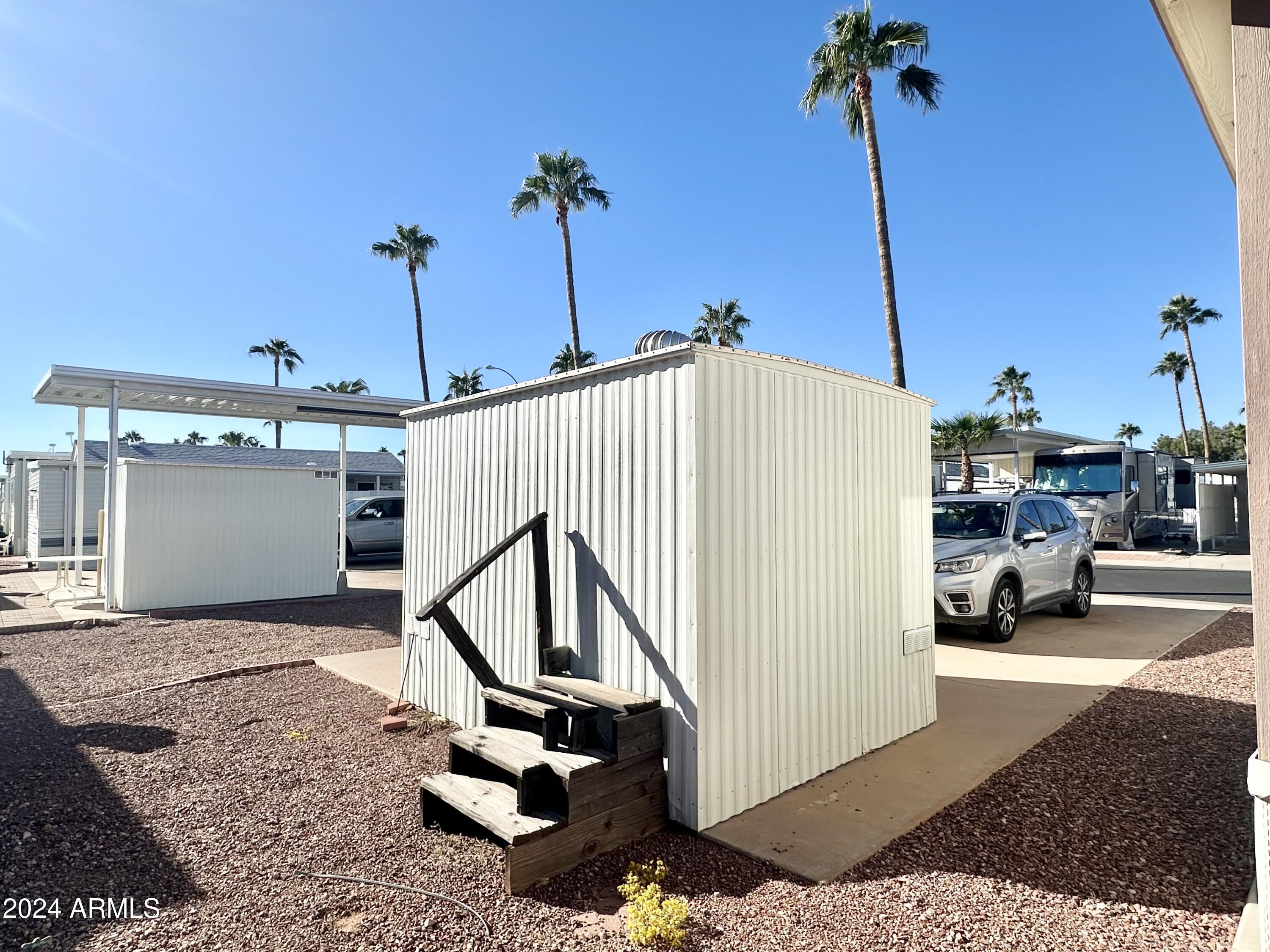 965 South Oxide Drive, Unit 965 Apache Junction, AZ 85119 - Photo 6 of 13 BACK/SIDE VIEW OF LOT
