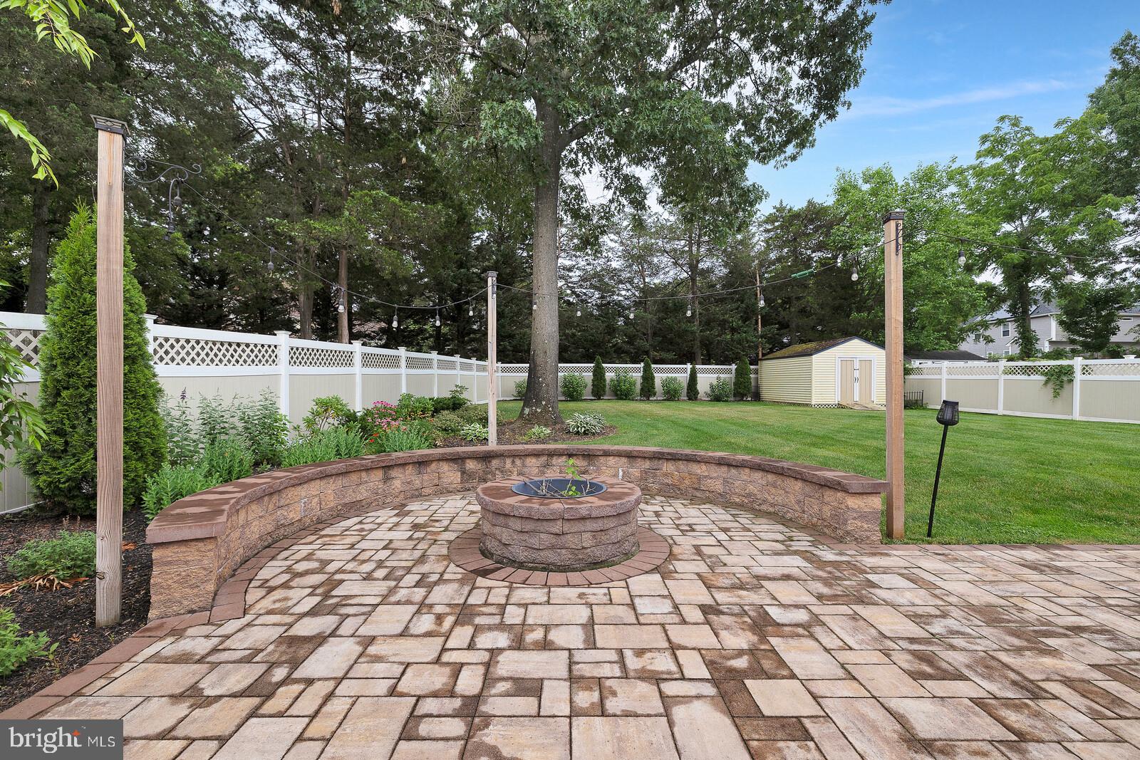 505 Buxton Road Toms River, NJ 08755 - Photo 23 of 31 Serene backyard retreat with fire pit.