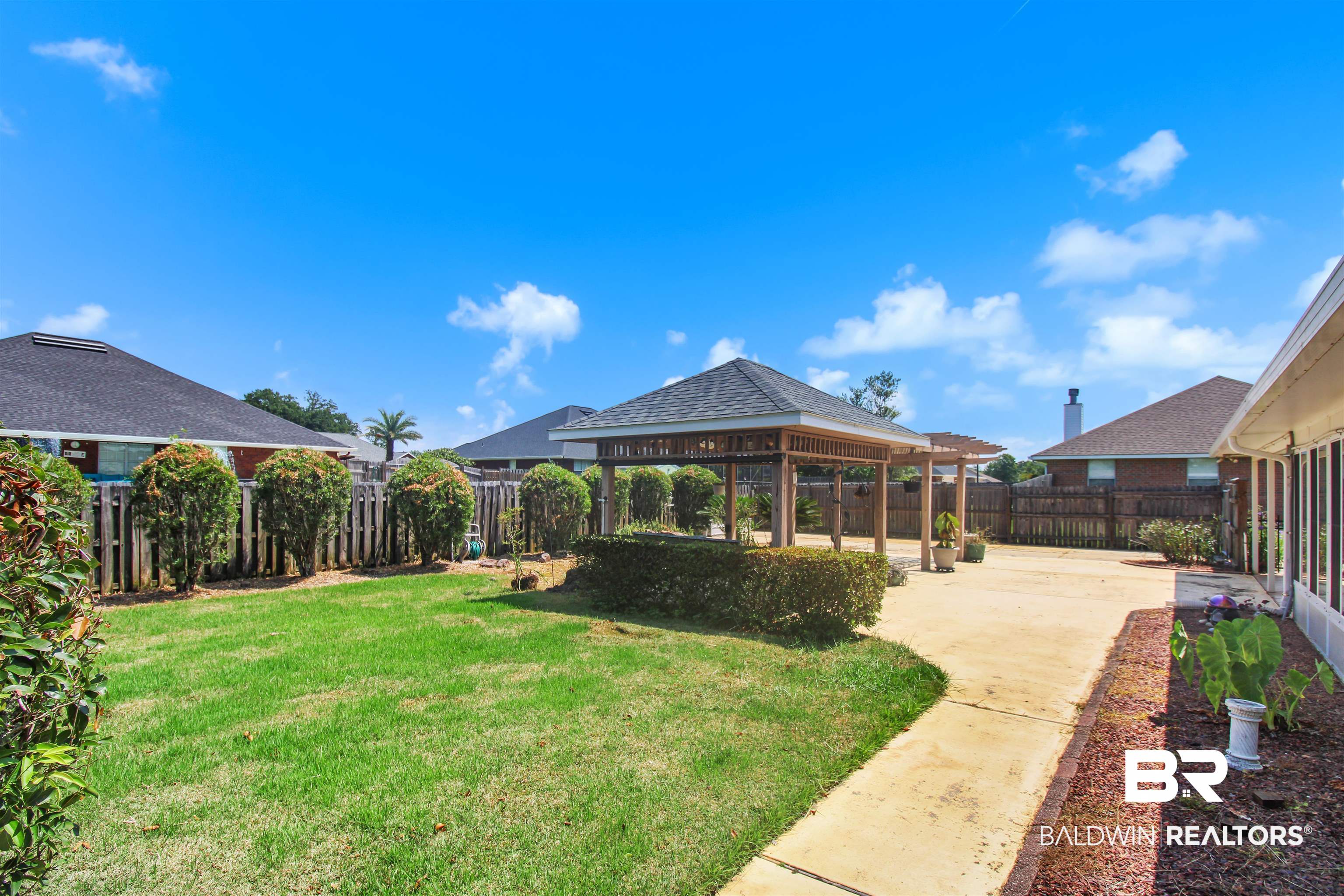412 Collinwood Loop Foley, AL 36535 - Photo 2 of 23 View of yard featuring a patio and a gazebo